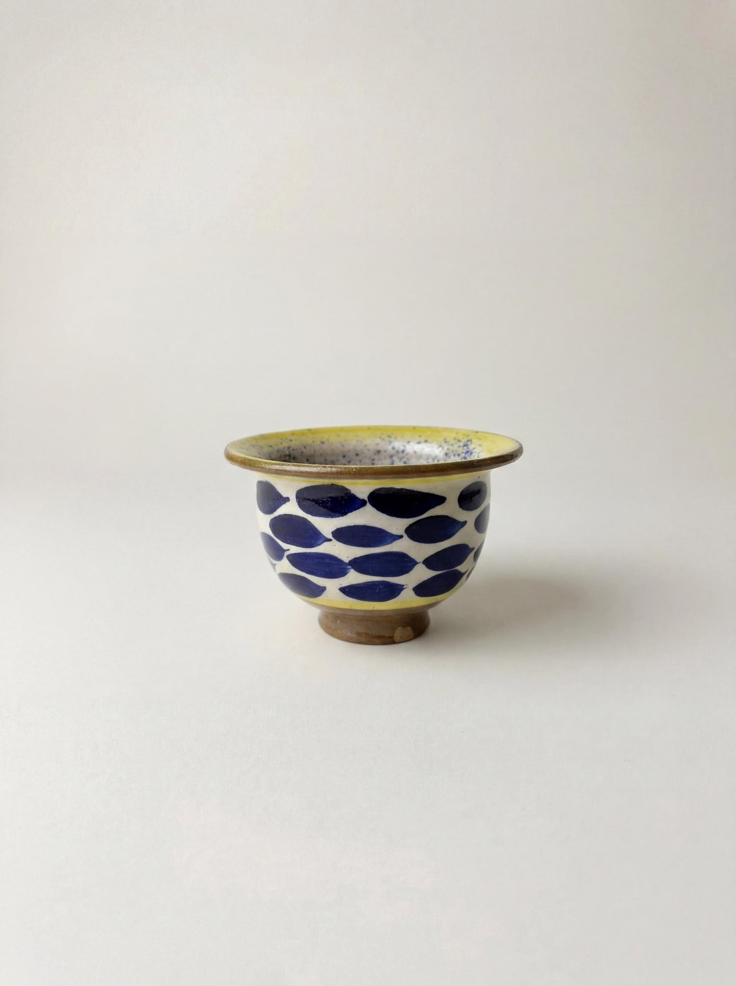 Fayoum pottery Hand-Painted Fayoum Pottery Bowl: Egyptian Ceramic Mezze Dish, Yellow Rim Blue Dot Design - detail view