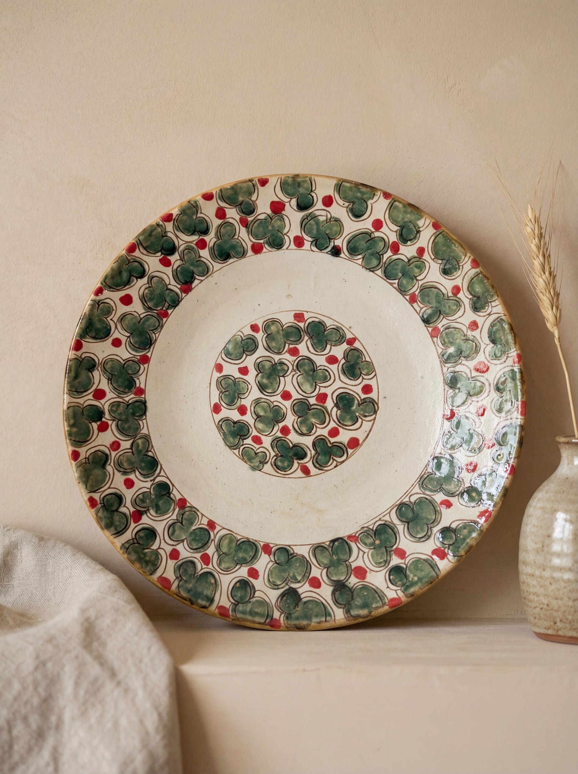 Fayoum pottery Handmade Fayoum Ceramic Plate – Green Floral Pattern – 37 cm - front view