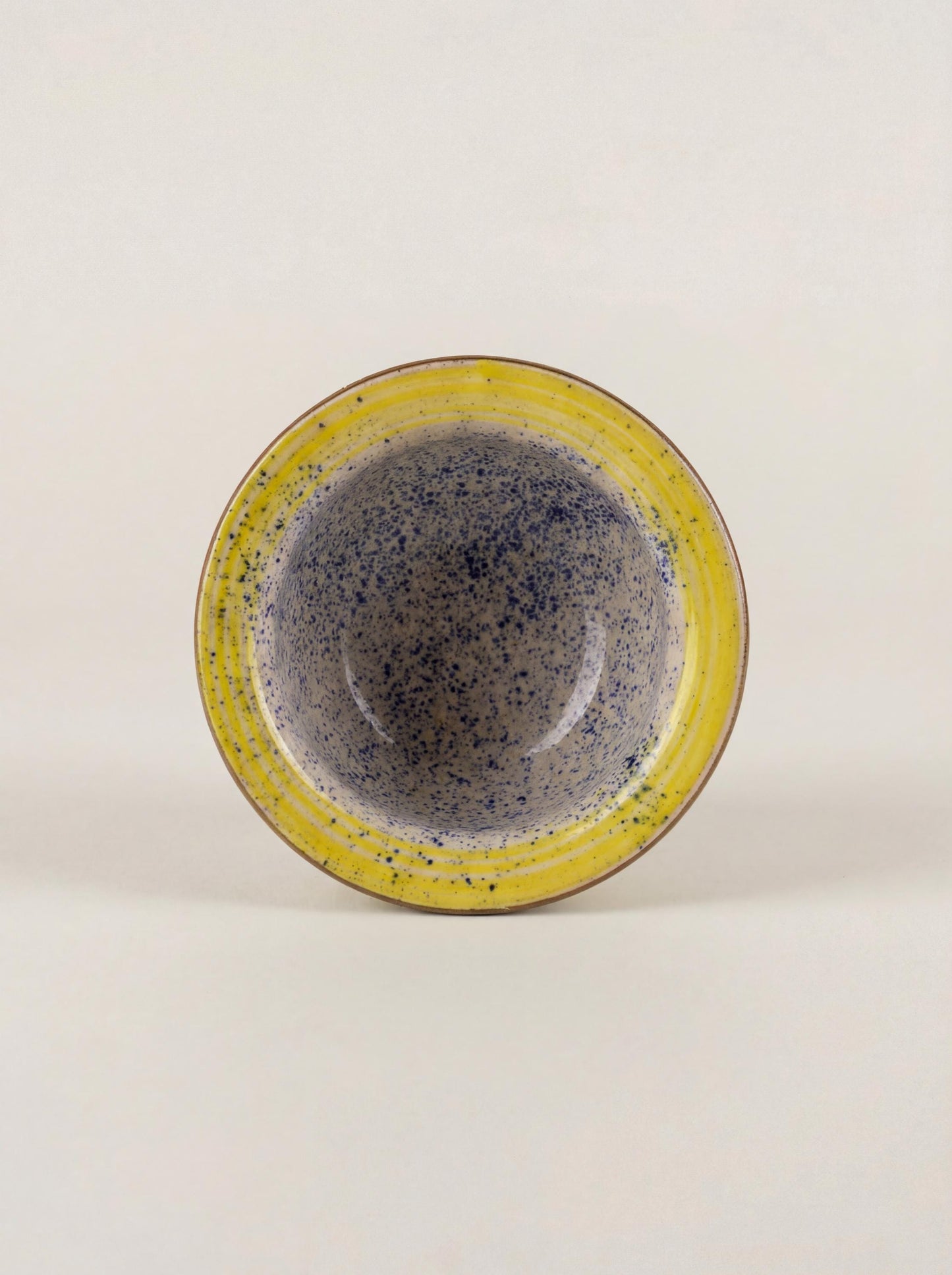 Fayoum pottery Hand-Painted Fayoum Pottery Bowl: Egyptian Ceramic Mezze Dish, Yellow Rim Blue Dot Design - side view
