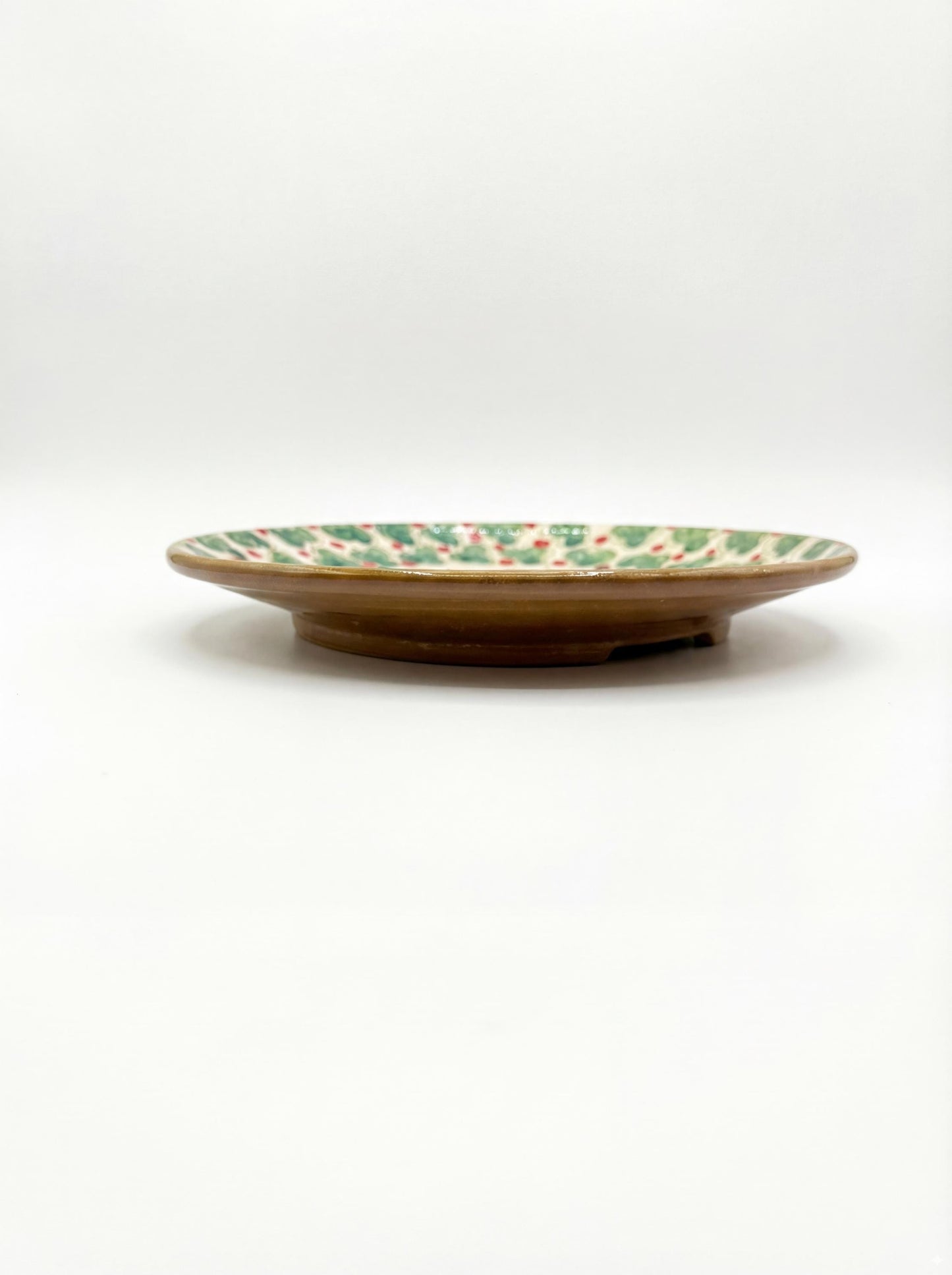 Fayoum pottery Handmade Egyptian Dinner Plate – Fayoum Pottery, Green & Red Clover Design - detail view