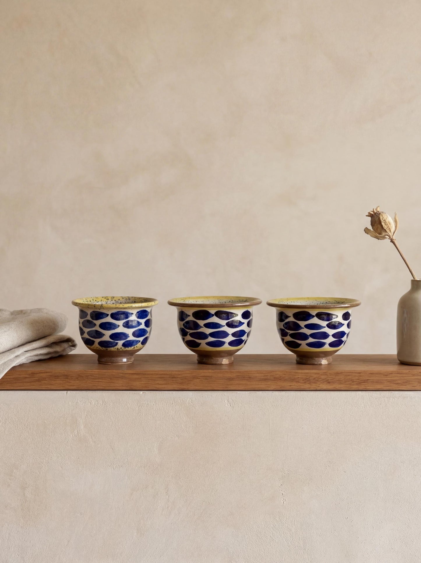 Fayoum pottery Hand-Painted Fayoum Pottery Bowl: Egyptian Ceramic Mezze Dish, Yellow Rim Blue Dot Design - front view